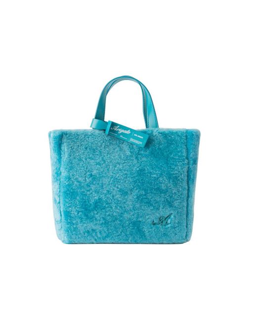 axel arigato blue