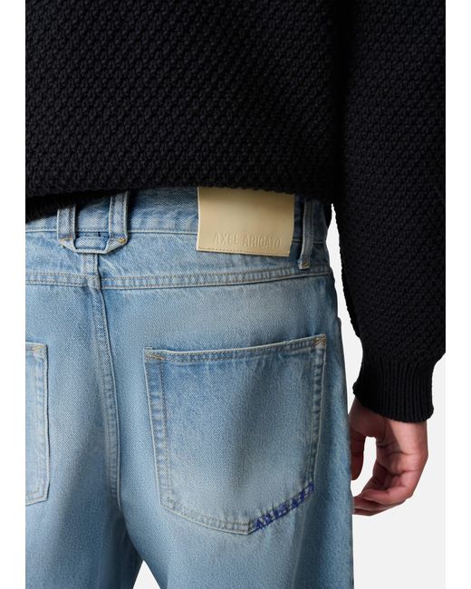 Axel Arigato Blue Zine Coated Jeans for men