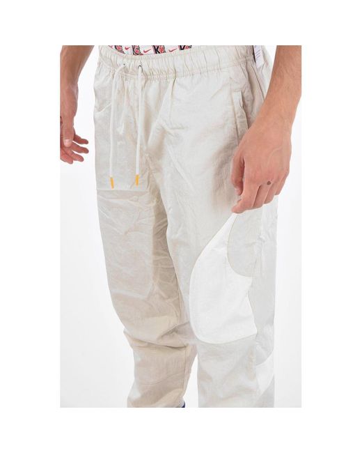 Nike Logo Embroidered Jogger in White for Men Lyst