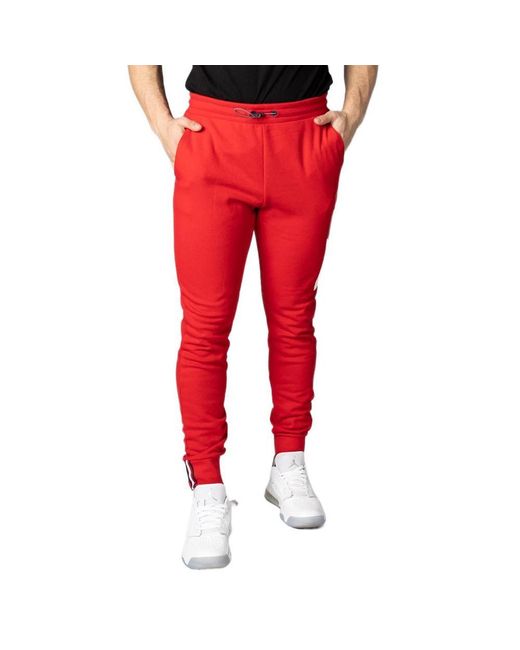 Tommy Hilfiger Jeans Trousers in Red for Men | Lyst