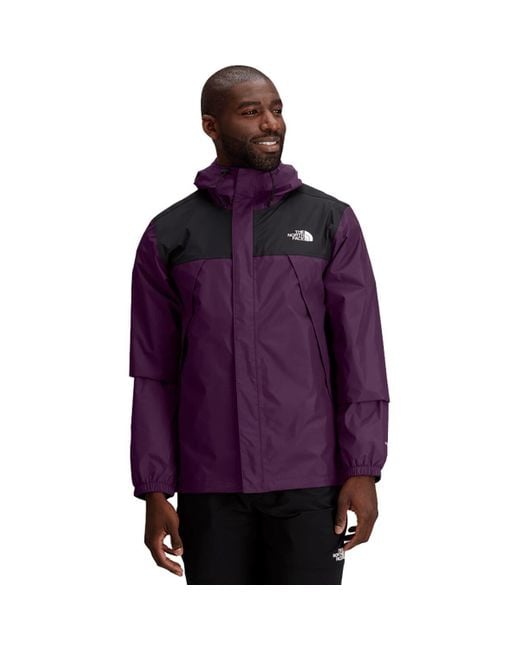 Purple north face windbreaker best sale