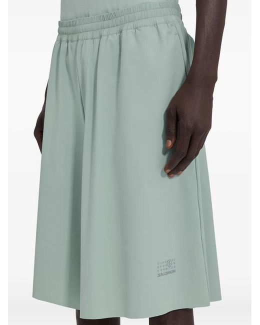 MM6 MAISON MARGIELA X SALOMON Green Mm6 Maison Margiela X Salomon X Salomon Shorts With Numerical Graphics