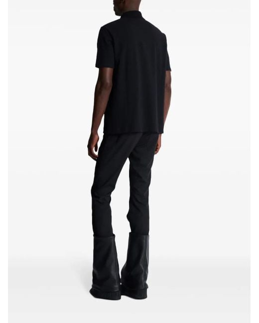 Balmain Polo -Hemd mit Logo -Stickerei in Black für Herren