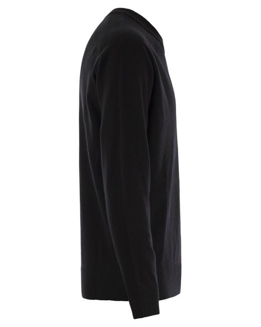 Stone Island Black Crew Neck Jumper With Raglan Sleeves And Ribbed Edges