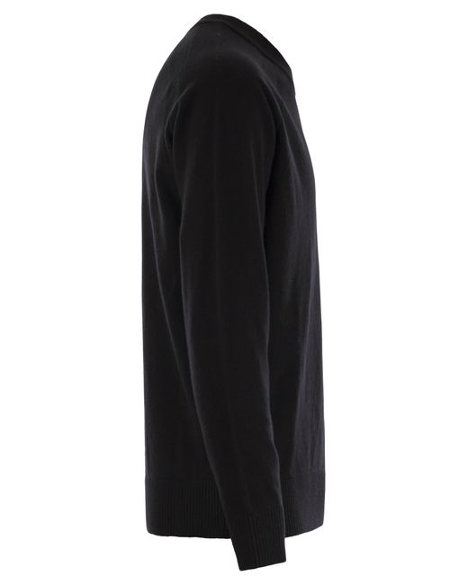 Stone Island Crew Neck Jumper Met Raglan -mouwen En Geribbelde Randen in het Black