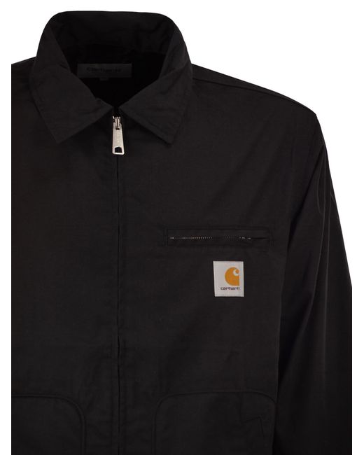 Carhartt Black Jacket With A Logo On The Chest
