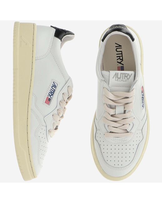 Autry White Perforated Leather Sneakers With Contrast Heel Tab And Logo Detail