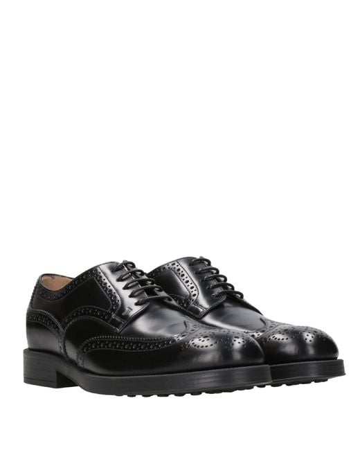 Tod's Black Flat Shoes