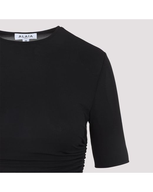 Blouses Alaïa en coloris Black