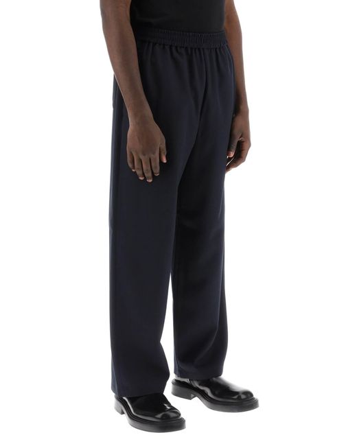 Pantalones sueltos de acné Studios con cintura elástica Acne de hombre de color Blue