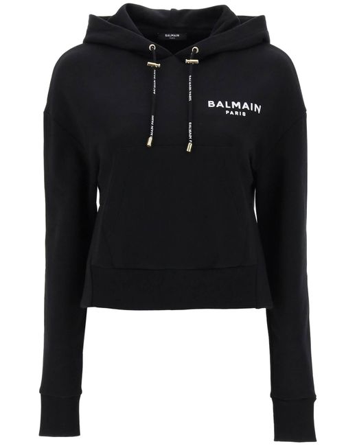 Balmain Black Cropped Sweatshirt mit flockigem Logo -Druck