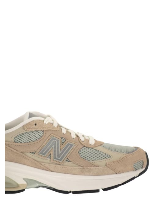 New Balance White U2010 Trainers With Side Logo
