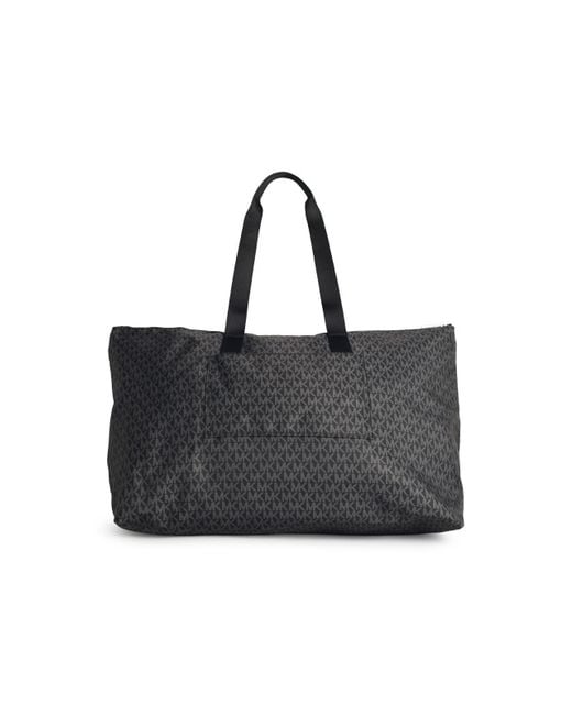 'Tanner' Gran bolsa reversible y plegable en poliéster negro MICHAEL Michael Kors de color Black