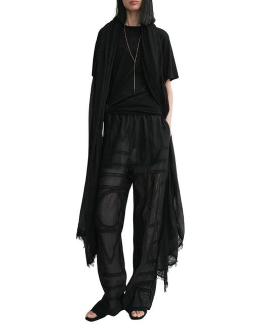 Pantalones de crochet de monograma de en negro Totême  de color Black