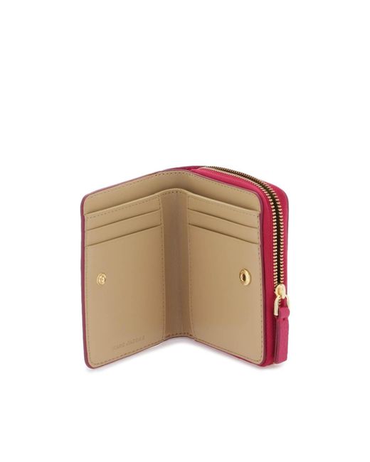 La mini billetera de cuero Mini Compact Marc Jacobs de color Pink