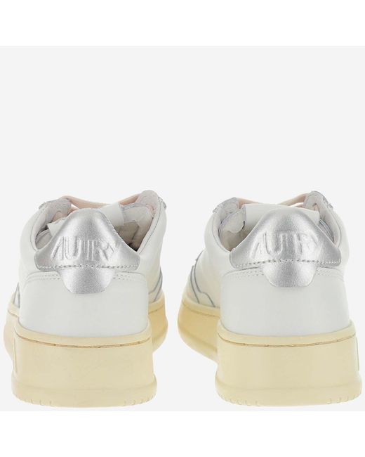Autry White Leather Trainers With Front Lacing And Metallic Heel Tab