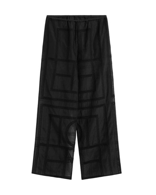 Pantalones de crochet de monograma de en negro Totême  de color Black