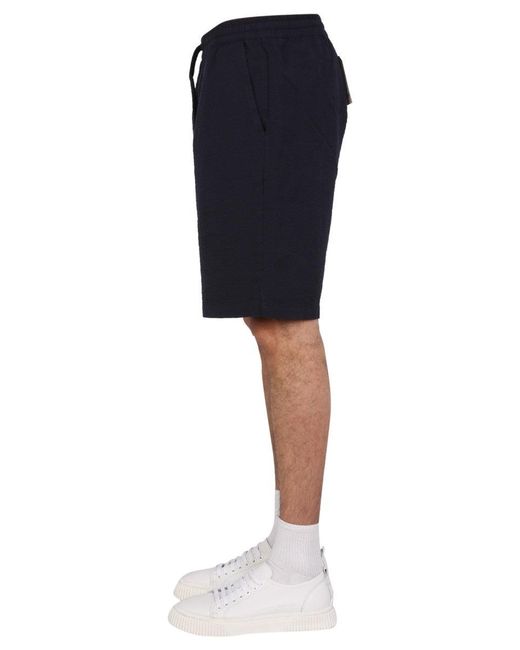 Universal Works Blue Fleece Bermuda for men