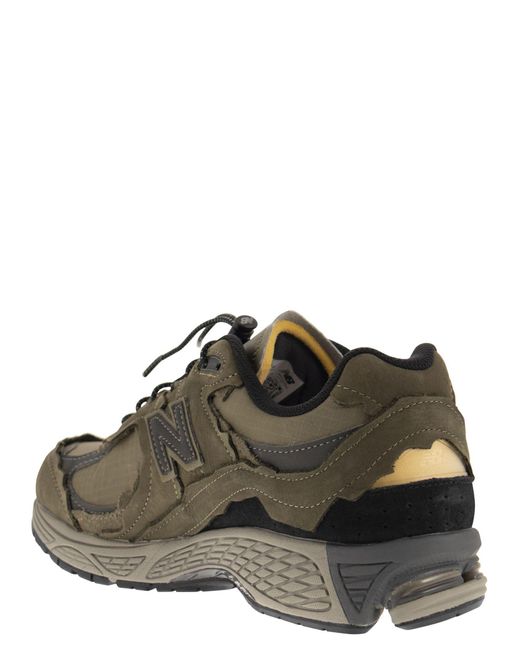 New Balance M2002 Sneakers | Lyst