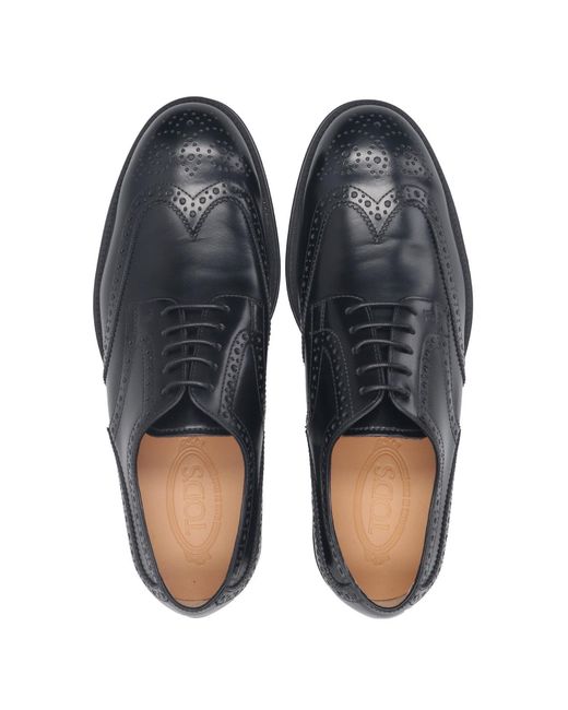 Tod's Black Flat Shoes