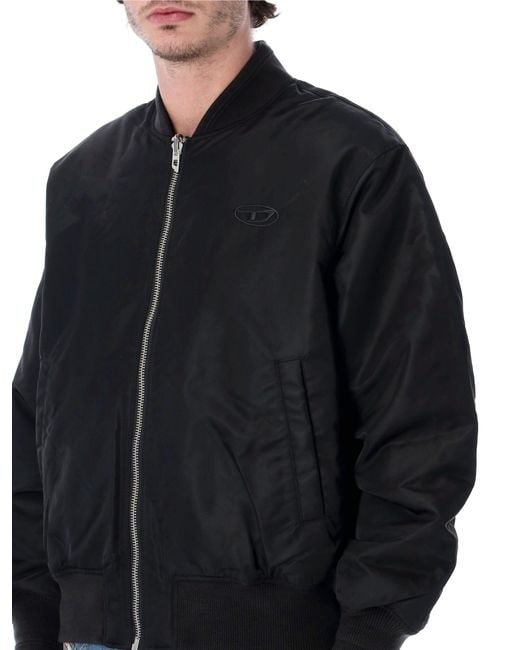 DIESEL Black Coats for men