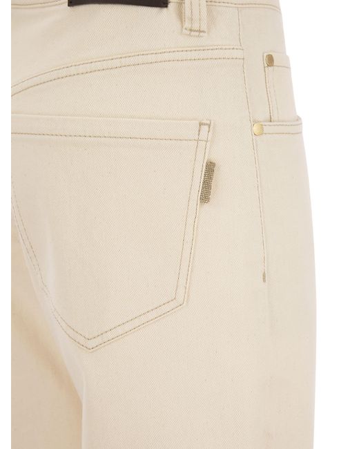Pantaloni sciolti in denim comfort tinto di abbigliamento con linguetta luccicante di Brunello Cucinelli in Natural