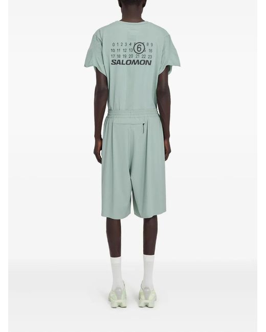 MM6 MAISON MARGIELA X SALOMON Green Mm6 Maison Margiela X Salomon X Salomon Shorts With Numerical Graphics