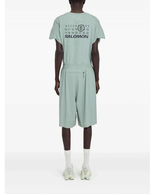 MM6 MAISON MARGIELA X SALOMON Green Mm6 Maison Margiela X Salomon X Salomon Shorts With Numerical Graphics