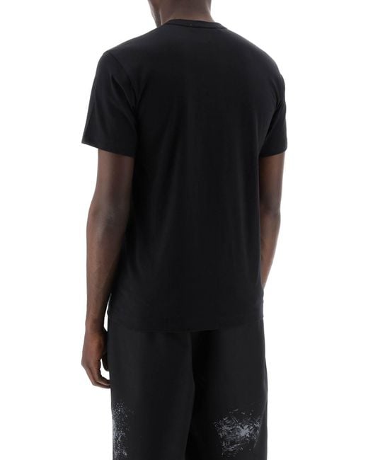 Comme des Garçons Logo Druck T -Shirt in Black für Herren
