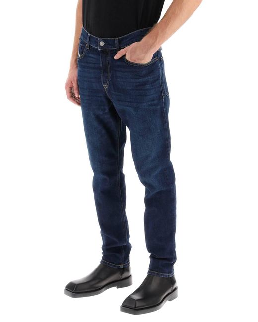 DIESEL 'D Fininging' Jeans mit verjüngten Bein in Blue für Herren