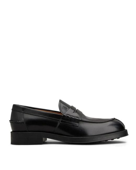 Tod's Black Leather Loafers