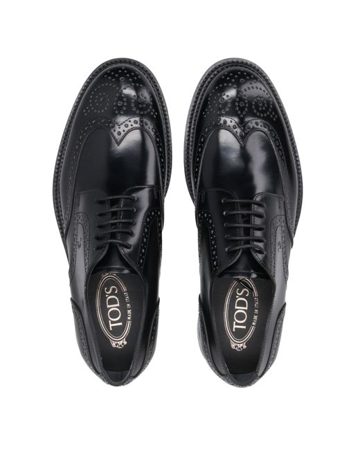 Tod's Black Flat Shoes