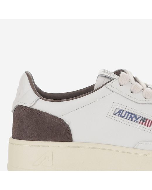 Autry White Round Toe Leather Sneakers With Suede Inserts And Logo Details