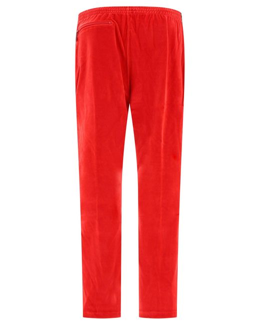 Pantalones de pista de terciopelo de agujas Needles de hombre de color Red