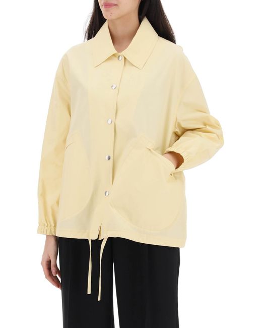 "Coach Jacket With Logo Stampa" di Jil Sander in Yellow