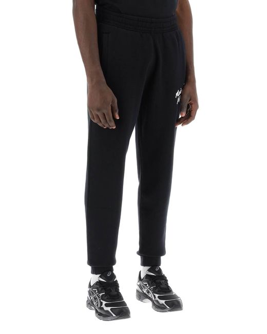 "Pantalon sportif avec écriture Maison Kitsuné pour homme en coloris Black