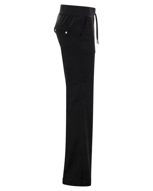 Pantalones de terciopelo de algodón de alta costura Juicy Couture de color Black