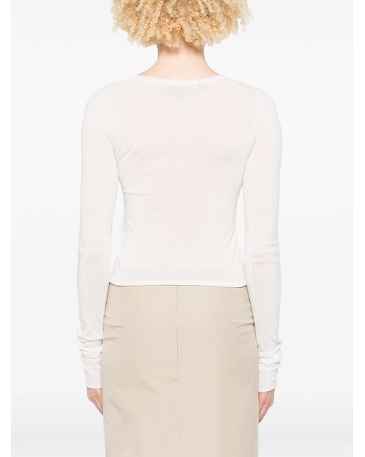 Notre héritage atteint un tricot Our Legacy en coloris White
