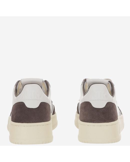 Autry White Round Toe Leather Sneakers With Suede Inserts And Logo Details