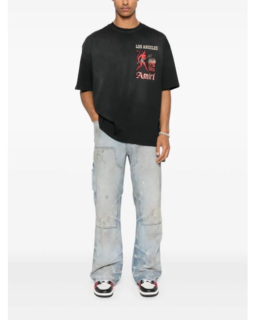 Amiri Blue Jeans With A Distressed Effect for men