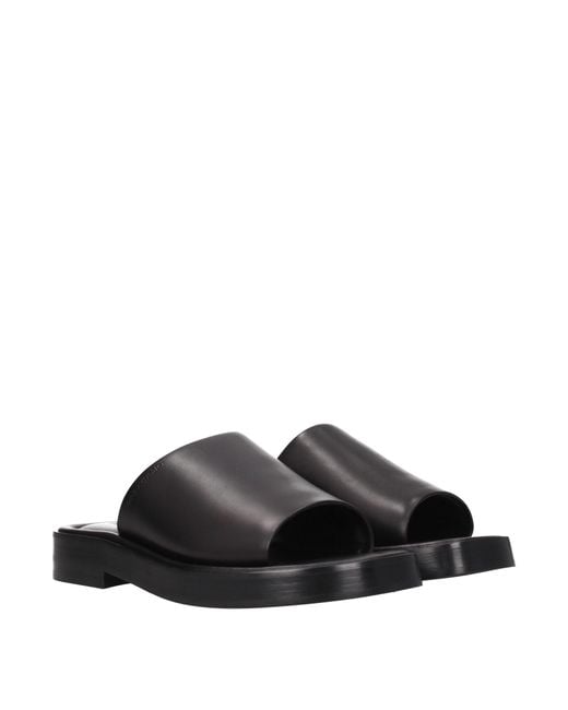 Ferragamo Black Leather Slides And Clogs