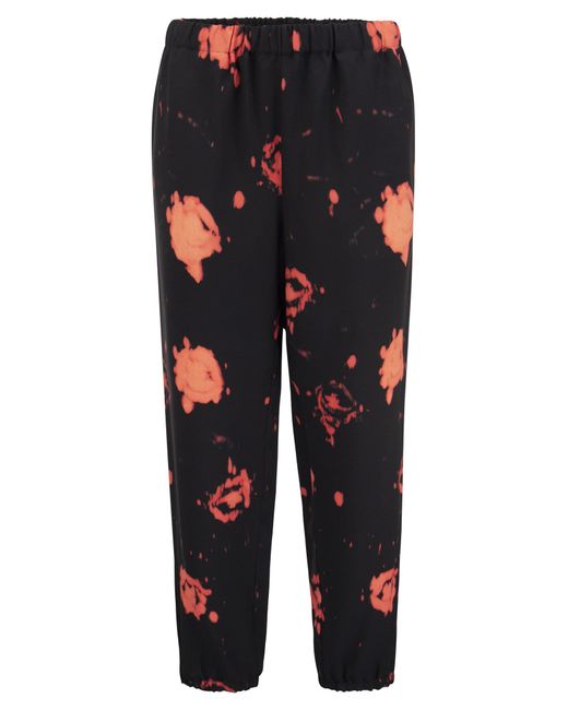 Pantalon avec des roses fanées imprimées Marni en coloris Black