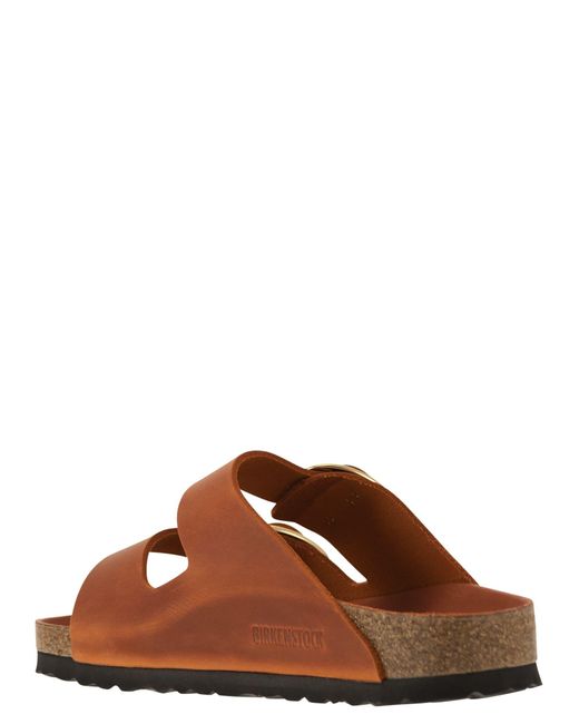 Sandalia de zapatilla Arizona Birkenstock de color Brown