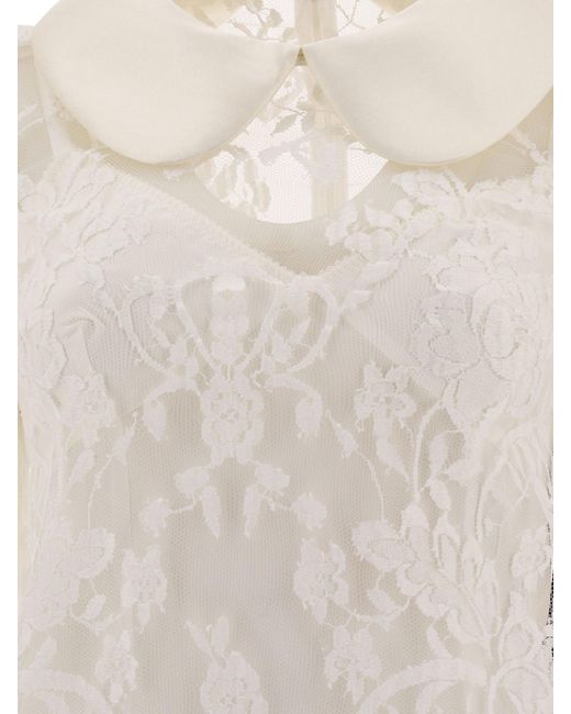 Robe en dentelle avec col satiné Dolce & Gabbana en coloris White