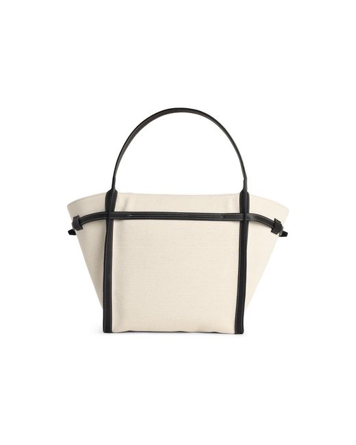 Tod's Metallic 'Shopping Tim' Canvas And Midi Lear Bag