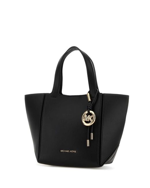 MICHAEL Michael Kors Black Handbags.