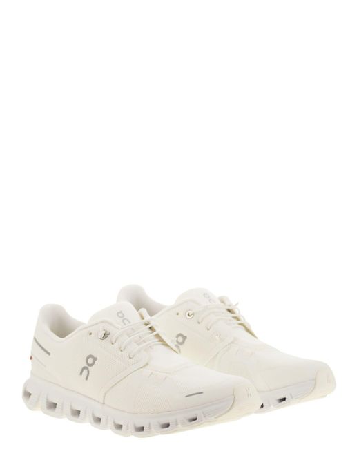 En la nube 6 zapatillas On Shoes de hombre de color White