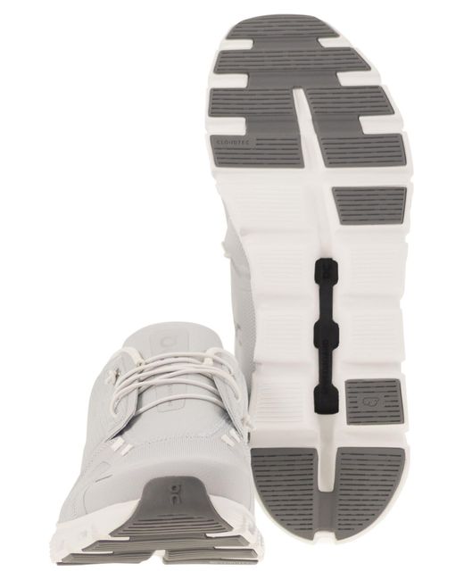 En la nube 6 zapatillas On Shoes de hombre de color White