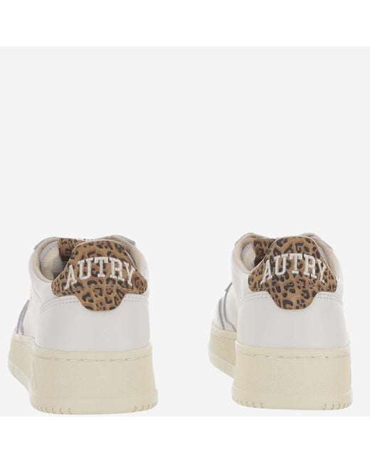 Autry White Low-Top Leather Sneakers With Suede Heel Tab And Logo Accents