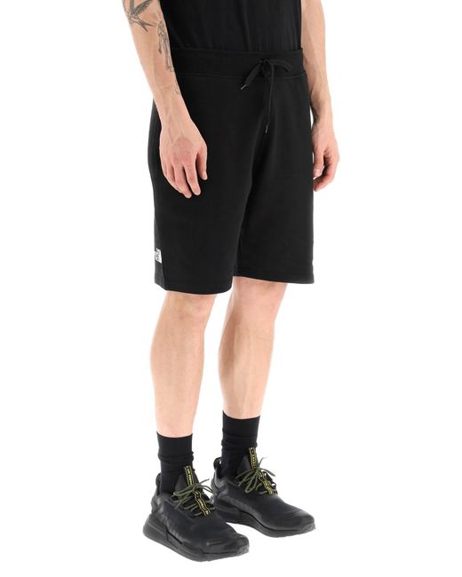 Pantalones cortos tipo jogger con detalle de logotipo estampado de The  North Face de hombre de color Negro | Lyst